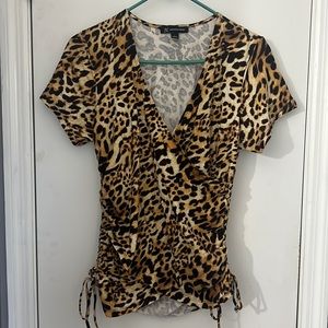 Animal print vneck top. Size large